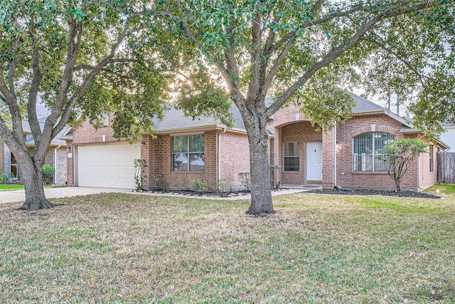 ranch-style home with a garage and a front lawn