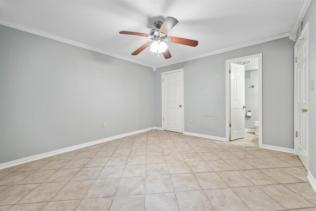 unfurnished bedroom with ensuite bath, crown molding, light tile patterned flooring, and ceiling fan