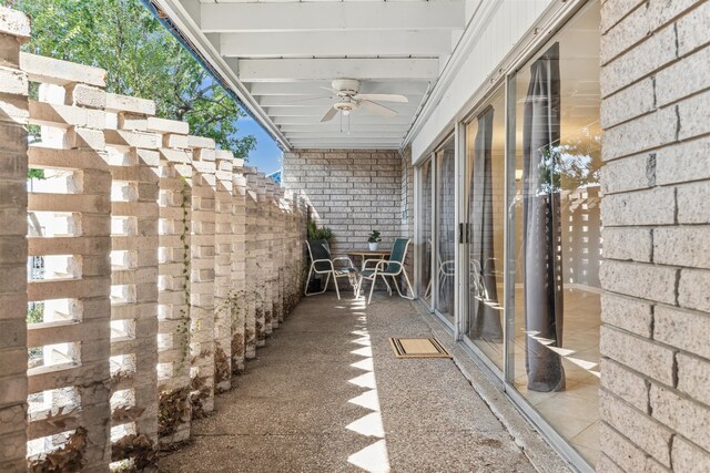 view of patio featuring ceiling fan