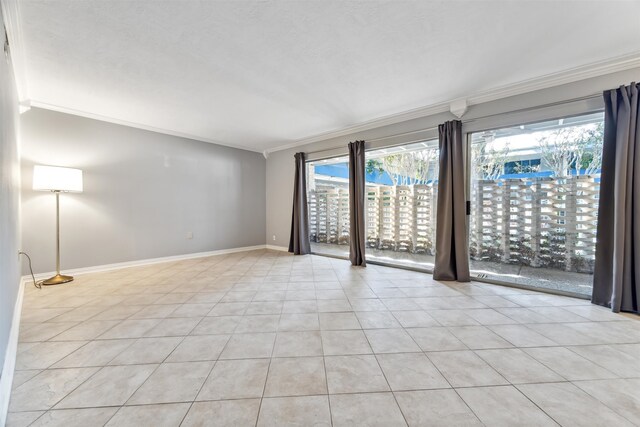 tiled empty room with ornamental molding