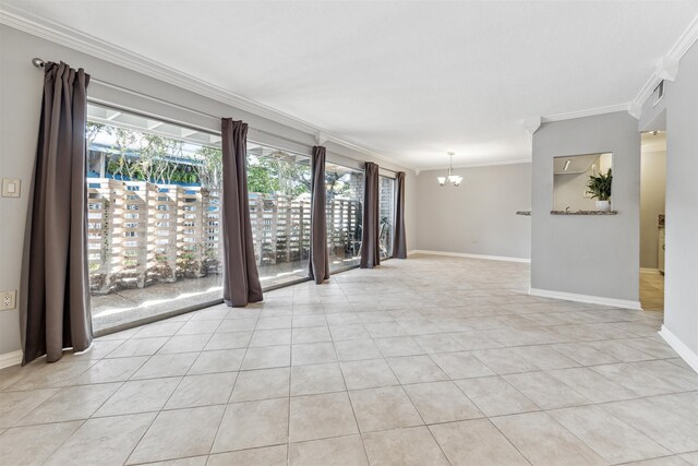 empty room with an inviting chandelier, light tile patterned floors, and crown molding