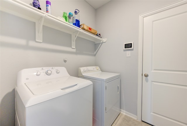 laundry area featuring washing machine and dryer