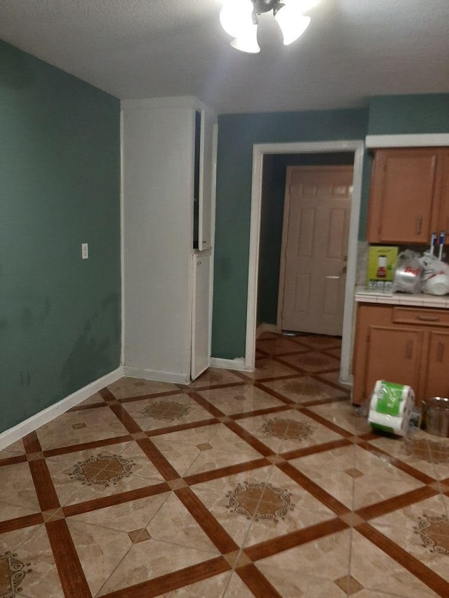 interior space with a textured ceiling