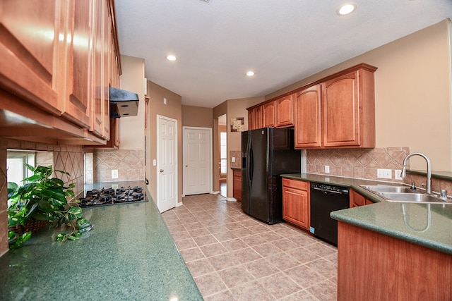 kitchen with sink, black appliances, decorative backsplash, and light tile patterned floors