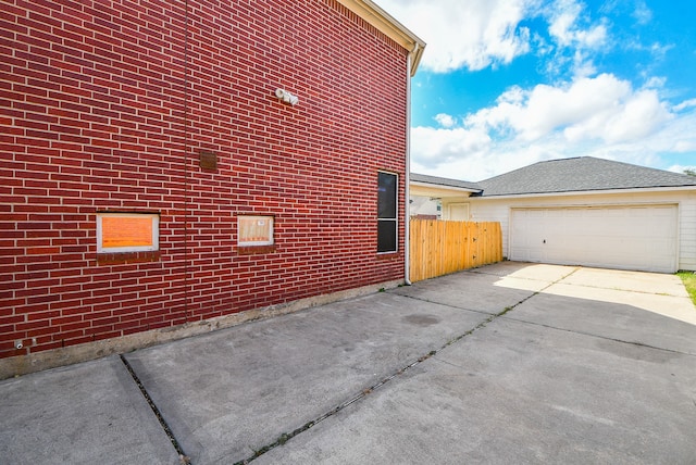 view of property exterior featuring a garage