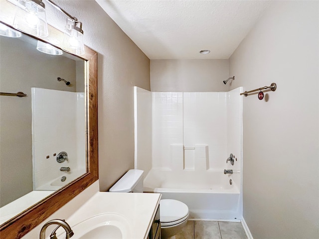 full bathroom featuring bathtub / shower combination, a textured ceiling, toilet, vanity, and tile patterned floors