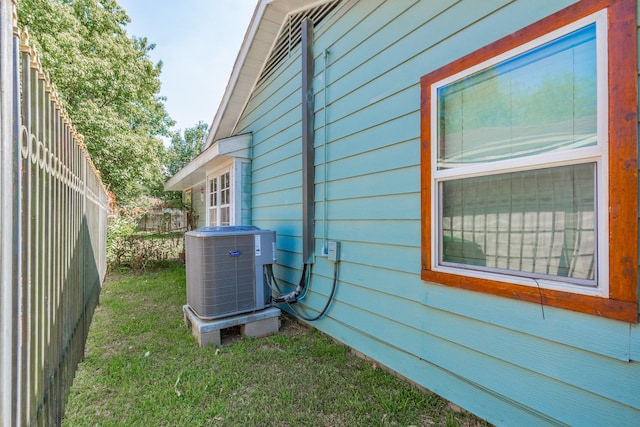 view of property exterior featuring central AC