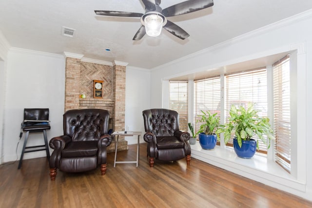 12410 Palmbeach St, Houston, TX 77034 - sitting room with crown molding, ceiling fan, visible vents, and wood finished floors