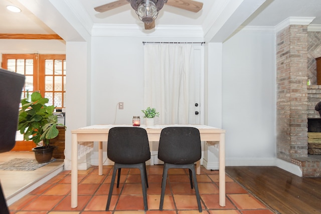 dining room featuring hardwood / wood-style floors, ceiling fan, and ornamental molding