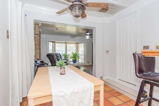 12410 Palmbeach St, Houston, TX 77034 - dining room featuring crown molding, light tile patterned floors, a ceiling fan, and visible vents
