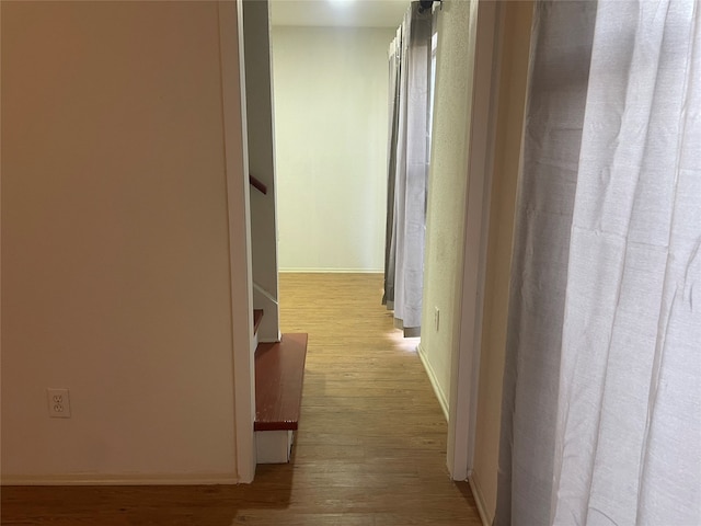 hallway featuring light wood-type flooring