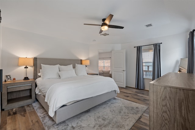 bedroom featuring light hardwood / wood-style flooring and ceiling fan