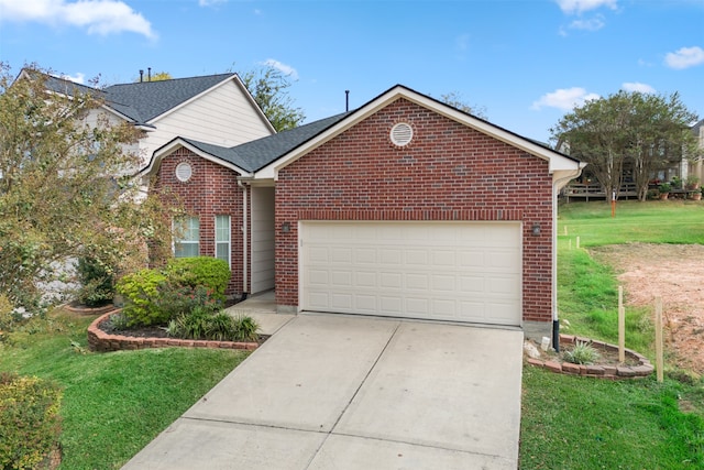 front of property with a front yard and a garage