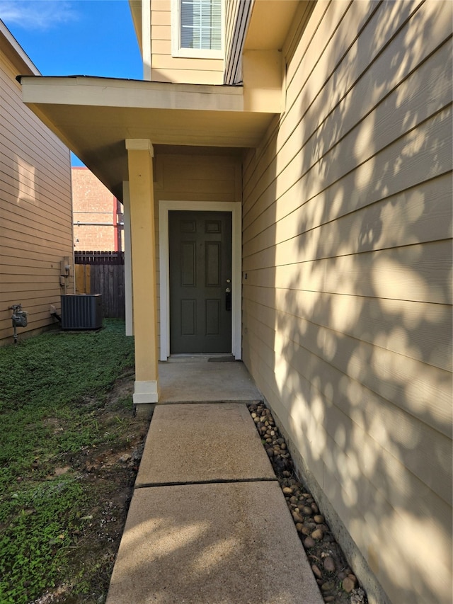 property entrance featuring cooling unit