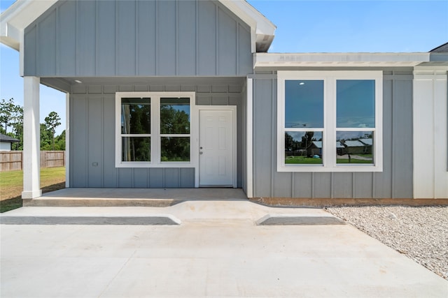 doorway to property featuring a patio