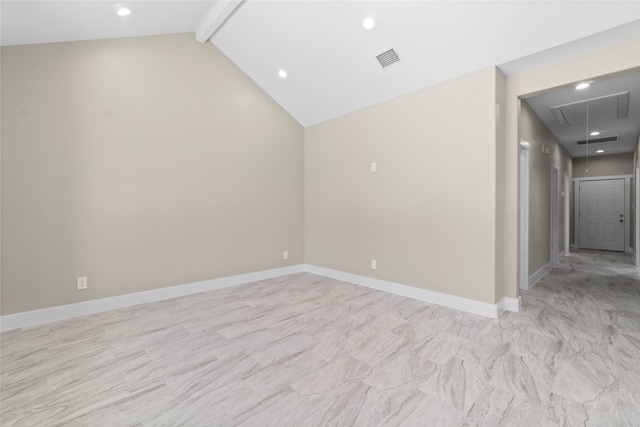 unfurnished room featuring lofted ceiling with beams