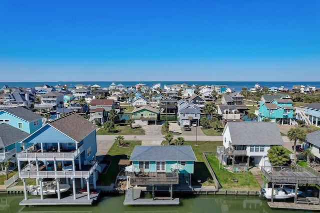 22819 Vida St, Galveston, TX 77554 - aerial perspective of suburban area with a large body of water