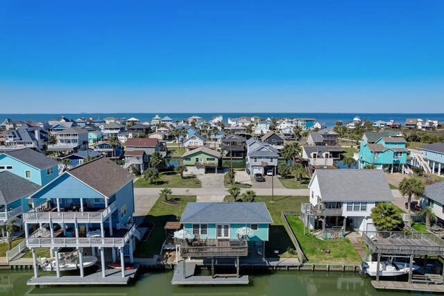 22819 Vida St, Galveston, TX 77554 - aerial perspective of suburban area featuring a large body of water
