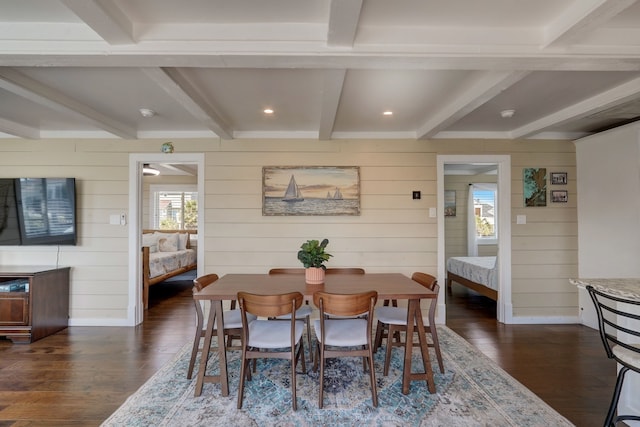 22819 Vida St, Galveston, TX 77554 - dining room with dark wood-type flooring, beam ceiling, wooden walls, and recessed lighting