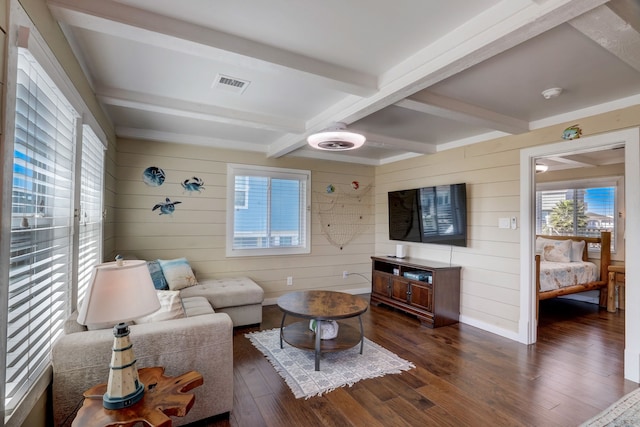 22819 Vida St, Galveston, TX 77554 - living area with wooden walls, dark wood-type flooring, and beamed ceiling