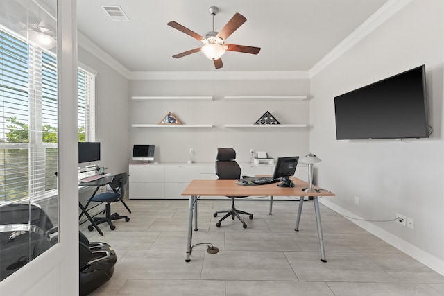 tiled home office with ceiling fan and ornamental molding