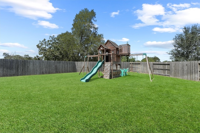 view of play area featuring a lawn