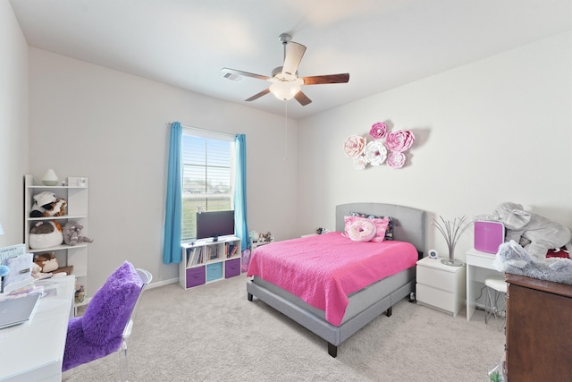 carpeted bedroom featuring ceiling fan