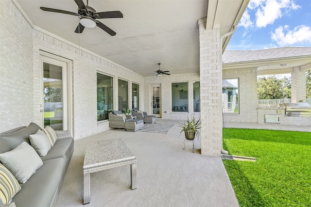 view of patio / terrace featuring an outdoor hangout area, area for grilling, and ceiling fan