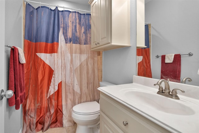 bathroom with a shower with curtain, tile patterned flooring, vanity, and toilet