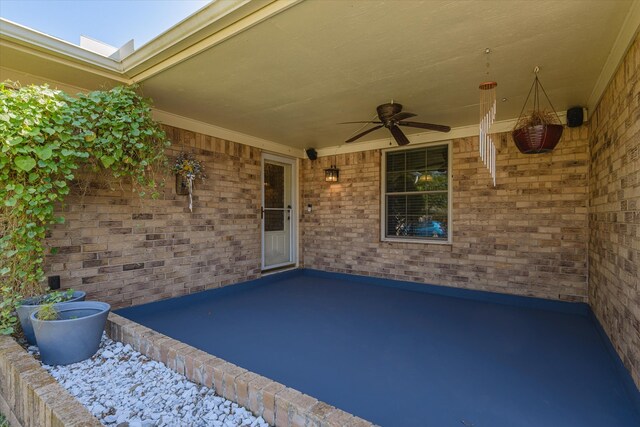 view of patio with ceiling fan