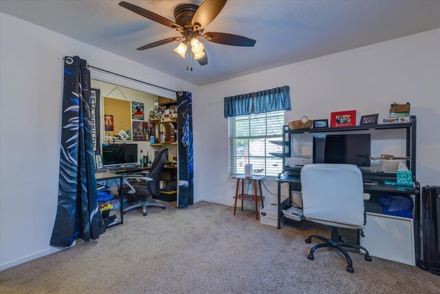 office area featuring carpet and ceiling fan