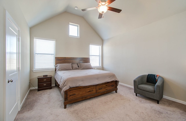 carpeted bedroom featuring ceiling fan and lofted ceiling