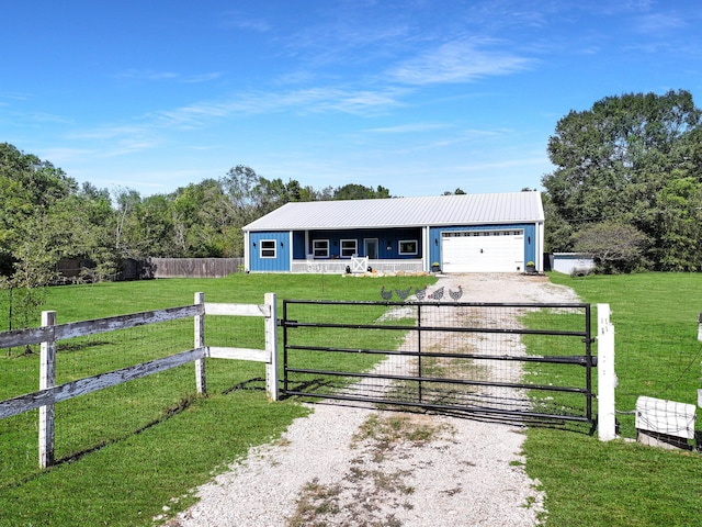 single story home featuring covered porch and a front lawn