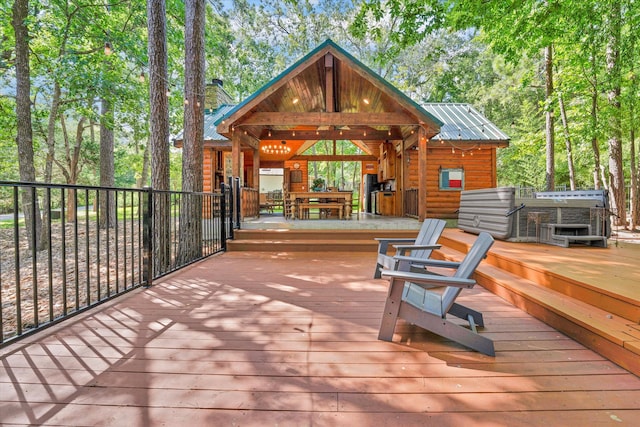 deck with a hot tub