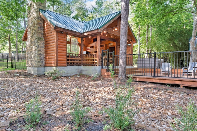 exterior space featuring a wooden deck