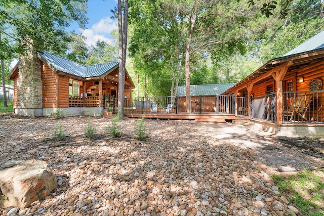 view of yard with a wooden deck