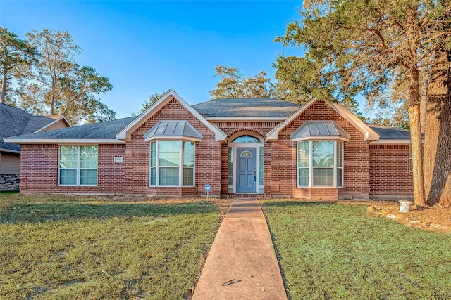 view of front of house with a front yard