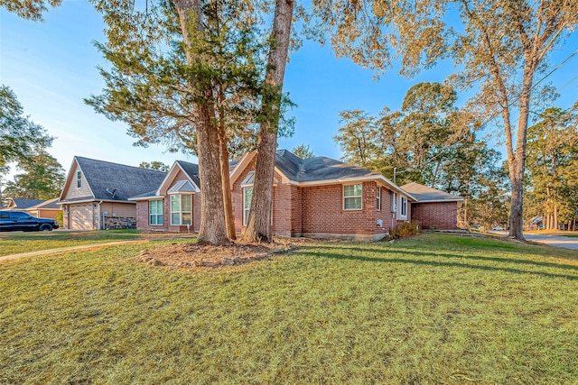 single story home with a front yard