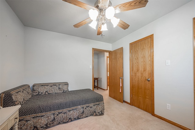 carpeted bedroom featuring ceiling fan