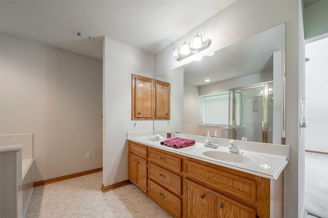 bathroom featuring vanity and a shower with door