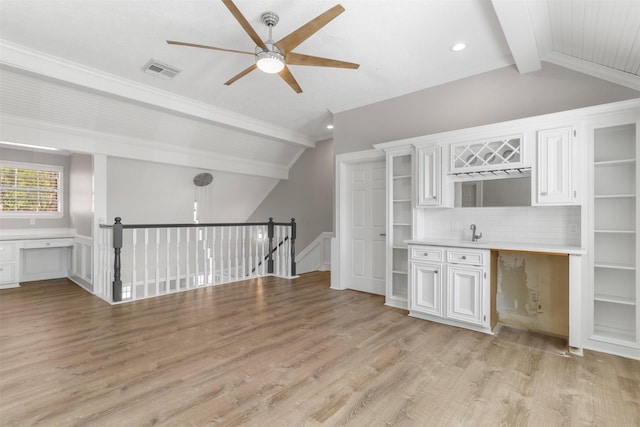 unfurnished living room with lofted ceiling with beams, ceiling fan, and light hardwood / wood-style flooring