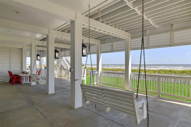 11707 Beachside, Galveston, TX 77554 - view of patio with view of water and beach