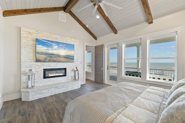 11707 Beachside, Galveston, TX 77554 - bedroom with wood finished floors, baseboards, access to outside, a stone fireplace, and wood ceiling