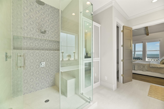 11707 Beachside, Galveston, TX 77554 - bathroom featuring a stall shower, ensuite bath, ornamental molding, tile patterned flooring, and a water view