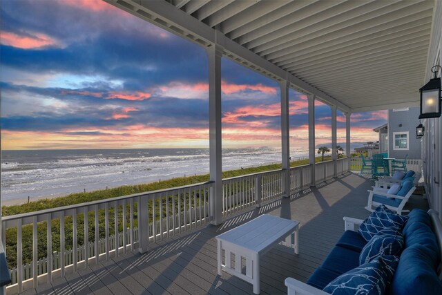 11707 Beachside, Galveston, TX 77554 - wooden terrace featuring view of water and beach