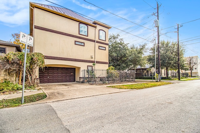 exterior space with a garage