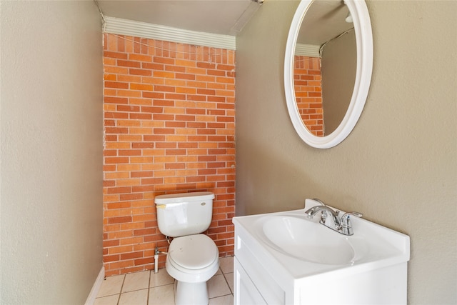 bathroom with vanity, toilet, and tile patterned flooring