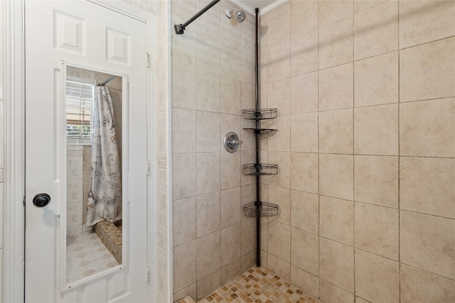 bathroom with a shower with shower curtain