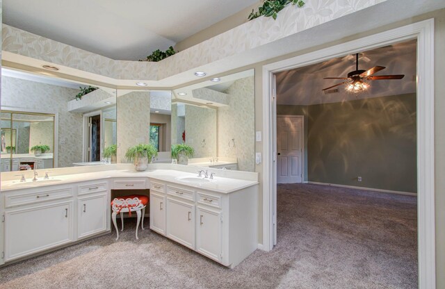 bathroom featuring vanity and ceiling fan