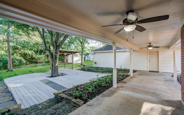 view of patio / terrace featuring ceiling fan